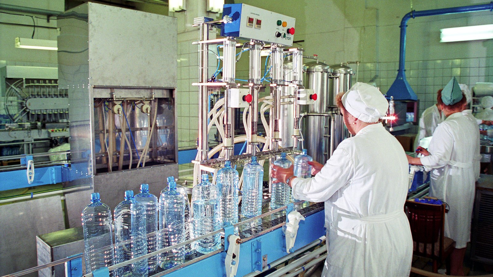 A packaging and bottling line running in a plant
